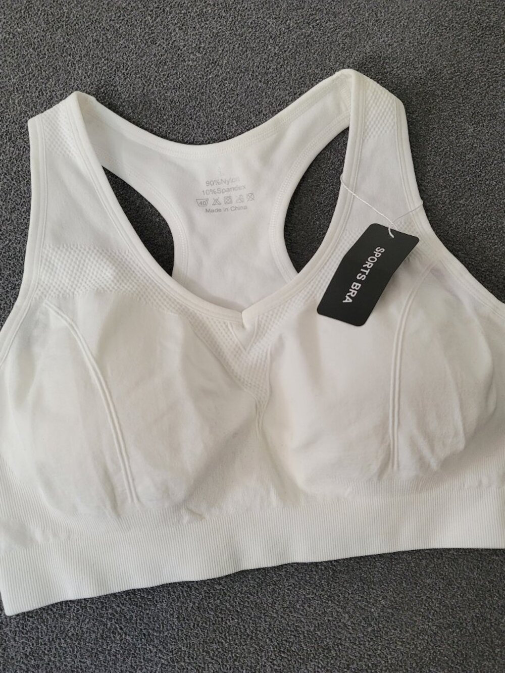 white seamless racerback sports bra size L